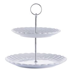 two tiered serving trays with metal handles, each holding an individual's plate