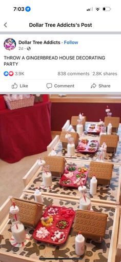 the table is decorated with gingerbread house decorations and other things to make it look like they are eating