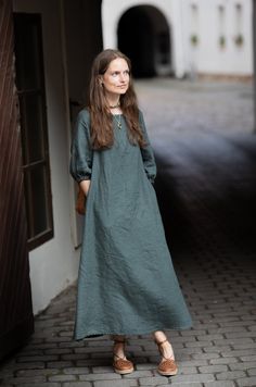 "linen dress BOTANIST | romantic dress with sleeves and pockets | gathered 3/4 sleeves | maxi summer dress | loose linen dress | boho dress -- ABOUT THE ITEM -- * Fabric: 100% linen, OEKO - TEX Standard 100 certified * Laundered and softened linen * Boat collar * Gathered 3/4 sleeves * Side seam pockets * Color is shown: FOREST GREEN (medium weight); MYSTIC FOREST (medium weight) * Standard length: 125cm * Can be made in a custom length (we are measuring from the top of the shoulder down to the bottom line) I'm wearing size S, dress length: 125cm my measurements are (Bust/Waist/Hips): (90cm/67cm/91cm), (35.4\"/26.4\"/35.8\"), height: 174cm/5.71ft -- PROCESSING TIME -- Each item is individually cut and sewn by order it will be made especially for you. Quality handmade items take time to mak Linen Dresses Elegant, Simple Linen Dress, Summer Dress Long, Mystic Forest, Sack Dress, Minimalist Dress, Dress Minimalist, Long Linen Dress, Dress Bohemian