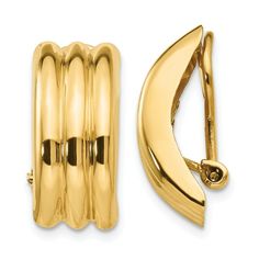 a pair of gold plated ear clips on a white background with clippings