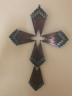 the cross is made out of metal strips