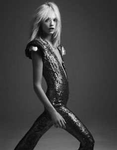 black and white photograph of woman in sequin jumpsuit