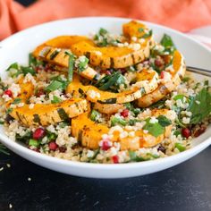 a white bowl filled with rice and vegetables