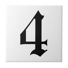 a black and white number four on a square tile wall decoration or flooring tiles