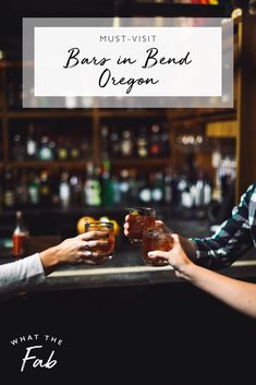 two people toasting at a bar with the words must visit bars in bend oregon