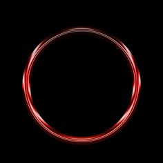 a red circle on a black background with some light coming from the top and bottom