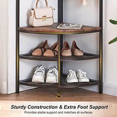 there is a round shelf with shoes and purses on it in front of a plant