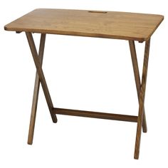 a wooden table with two crossed legs