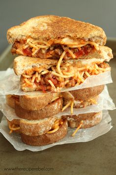 three sandwiches stacked on top of each other