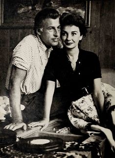 an old black and white photo of a man and woman