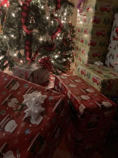 two presents under the christmas tree with lights