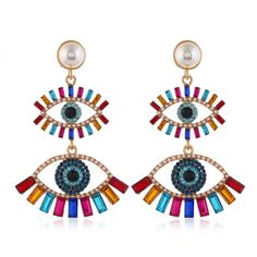 PRICES MAY VARY. 【Evil Eye Earrings】: These eye earrings are designed with love to protect the wearer from evil in the world, bring happiness, good luck, health and good fortune to the wearer, keep you and them away from pain and evil , they are inlaid made of high quality colored zirconia with bright colors to make the earrings look more delicate and shiny, the perfect size to complement your face shape, wearing it will make you look more charming, elegant and beautiful. [Evil Eye Crystal Earri Fashion Girl Design, Abstract Earrings, Punk Vintage, Evil Eyes, Retro Earring, Evil Eye Earrings, Wedding Party Jewelry, Statement Drop Earrings, Eye Earrings