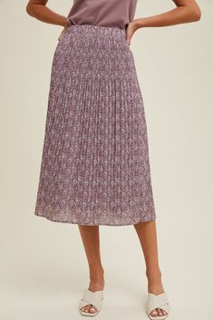 Get ready to twirl in style with our Purple Pleated Midi Skirt! This quirky and fun skirt features a beautiful purple hue, adding a pop of color to any outfit. The pleated design adds movement and playfulness, while the midi length is perfect for any occasion. Product Details: Elastic Waistband Lined 100% Polyester Wrangler Accessories, Skirt Jumpsuit, Top Graphic Tees, Purple Hues, Pleated Midi Skirt, British Indian, Dress Collection, Midi Length, In Style