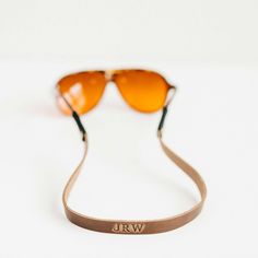 Leather Monogrammed Sunglass Strap | Clayton & Crume Leather Sunglass Strap, Leather Glasses Strap, Sunglass Strap, Leather Patterns, Glasses Strap, Vampire Weekend, Sunglasses Strap, 4 Girls, Louisville Kentucky