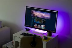 a desktop computer sitting on top of a white desk