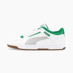 a white and green puma sneakers