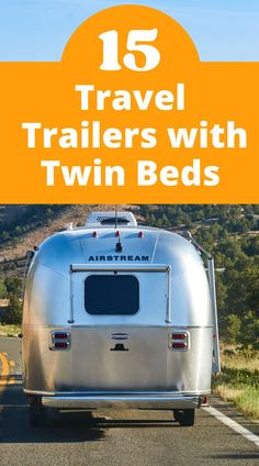 an airstream trailer on the road with text overlay that reads 15 travel trailers with twin beds