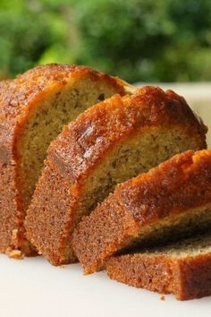 slices of banana bread sitting on top of a white plate