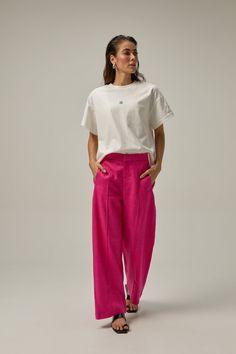 Made of 100% linen fabric, these pants have an elastic waist for added comfort and a straight cut to lengthen the legs. You can wear it high-waisted or on the hips for a more modern look. Our Reverie collection represents the idea of reconnecting with one's creative self and finding inspiration through moments of deep contemplation and imaginative thinking. COMPOSITION AND CARE Material: 100% linen Linen is one of the most sophisticated natural fiber fabrics. It does not hold or block air, nor d Hot Pink Linen Pants Outfit, Pink Flowy Pants Outfit, Modern Wide-leg Relaxed Fit Pants, Modern Relaxed Fit Wide-leg Pants, Modern Relaxed Fit Wide Leg Pants With Elastic Waistband, Modern Ankle-length Wide Leg Pants With Relaxed Fit, Modern Linen Wide Leg Pants For Workwear, Modern High-waisted Linen Wide Leg Pants, Modern Linen Bottoms For Work