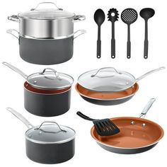 an assortment of pots and pans with utensils