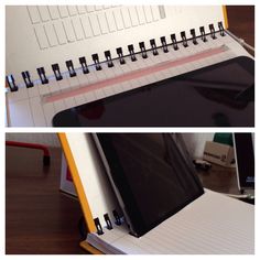 an open notebook sitting on top of a desk next to a computer monitor and keyboard