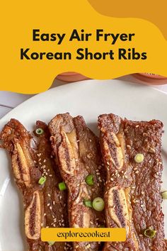 korean short ribs on a plate with sesame seeds