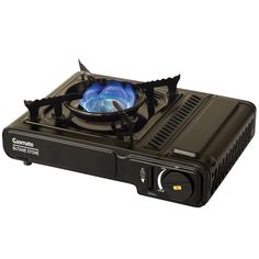 a black and blue gas stove on top of a white background