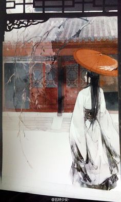 a woman with an orange umbrella walking in front of a red and white building on a snowy day