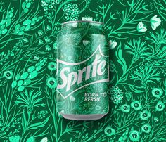 a can of sprite soda on a green floral background