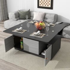 a living room with a couch, coffee table and wine glasses on the center table