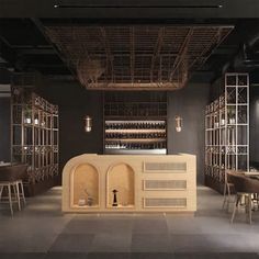 the interior of a wine bar with shelves and chairs in front of an empty counter