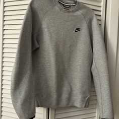 Size Is Mens S For An Oversized Fit. Never Worn Casual Nike Cotton Sweater, Gray Crew Neck Sportswear Sweater, Gray Crew Neck Sweater For Sportswear, Basic Nike Sweatshirt With Crew Neck, Casual Athletic Heather Sweatshirt For Sports, Nike Casual Sweatshirt In Athletic Heather, Nike Casual Athletic Heather Sweatshirt, Nike Casual Sports Sweater, Casual Athletic Heather Sweatshirt With Ribbed Cuffs