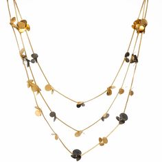 Elevate your style with the Gold and Oxidized Multi-Layered Necklace, also known as the Oxylis necklace. This piece blends contemporary elegance with playful sophistication, perfect for enhancing any outfit. Care and maintenance instructions:   Storage: Store each piece of jewellery individually in the original packaging or a soft pouch to prevent damage. Cleaning: Frequently polish your jewellery with a soft, lint-free cloth to maintain its original sparkling condition. Handling: Always put on Contemporary Jewellery Necklace, August Birthstone Jewelry, July Birthstone Jewelry, Multi Layer Necklace, Jewellery Necklace, Jewelry Ring Box, Physical Activity, Pearl Jewellery Earrings, Men's Jewelry Rings