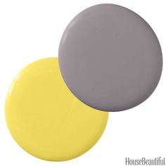 two yellow and gray circles with the words house beautiful on them