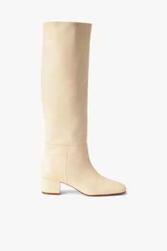 The Nancy is the epitome of the classic 60s knee high boot. The wider shaft and the slightly-square-but-round toe shape to give a vintage rainboot silhouette. Super comfy and cool for all occasions. Boot Fits, Heel Accessories, Mule Sandals, Goat Leather, Flat Boots, Denim Flares, Sneaker Heels, Fashion Books, New Handbags