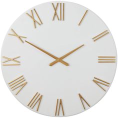 a white clock with gold hands and roman numerals on the face is shown