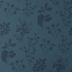 a blue wallpaper with small flowers and leaves on the back ground, against a dark blue background