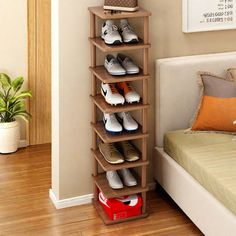 a shoe rack in the corner of a bedroom