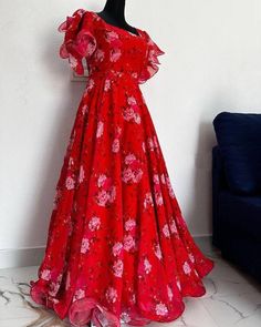 **RooRichWear Presenting Designer Red Printed Gown** GOWN ----------------------- Fabric. :- Fox Georgette Work :- Flower Printed Work Size :- M(38) L(40) XL(42) XXL(44) Height :- 42 Inch Flare :- 3.5 Mtr Wear :- Red Floral The Summer Beauty ♥️♥️♥️ For an absolutely stunning look, wear this Georgette maxi dress with flare sleeve, Its specially designed for comfortableness and Crafted from georgette Note : Color may vary due to the photography in the light effect. Printed Long Frocks, Long Frock Models, Ladies Frock Design, Floral Long Frocks, Floral Print Gowns