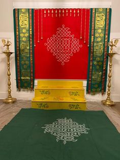 the altar is decorated with an intricately designed design on it's green carpet