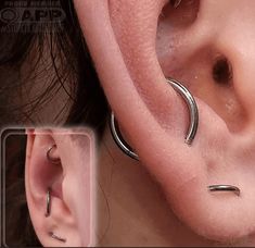 an image of a woman's ear with two piercings