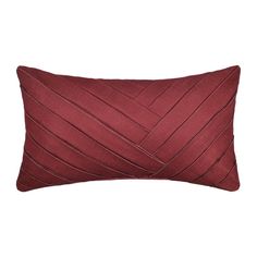 a red pillow with diagonal lines on it