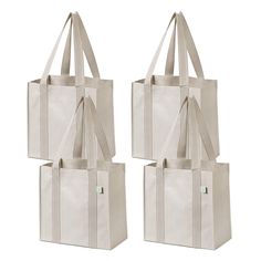 three canvas bags with handles and straps on each side