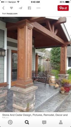 an outdoor covered porch with stone steps and seating area on the side of the house