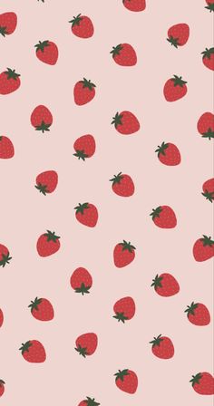 a pink background with red strawberries on it