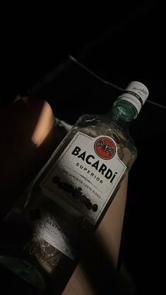 a bottle of bacardi vodka sitting on top of a counter