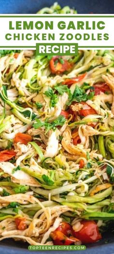 a blue bowl filled with noodles and vegetables