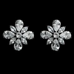 EUNICE EARRINGS: Make a statement with our EUNICE EARRINGS. These floral cluster teardrop and marquise cut stud earrings will add a touch of sophistication to your ensemble and will definitely make a statement for the day. EUNICE EARRINGS will add that finishing sparkle to any style or look. Great Gift Idea for that special someone. DESCRIPTION -AAA Micro Cubic Zirconia -Copper and White Gold Plated. Tarnish-free for brilliance -Lead, Nickel, and Cadmium Free - Measurement: 1.8cm COLORS Availabl Fancy Diamond Earrings, Marquise Earrings, Diamond Pendants Designs, Glamour Nails, Bling Earrings, Diamond Pendants, Jeweled Earrings, Solitaire Earrings, Diamond Necklace Set