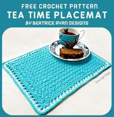 a crocheted tea time placemat with a cup and saucer on it