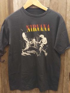 Nirvana Vintage ShirtNirvana Vintage Shirt   This model reduces inventory waste and allows customers to create personalized designs. These t-shirts are made from high-quality materials and come in a range of sizes and colors, making them versatile for any occasion. Grunge Screen Print Top For Festival, Festival Grunge Style Top With Screen Print, Grunge Festival Top With Screen Print, Grunge Crew Neck T-shirt For Festivals, Acid Wash Crew Neck T-shirt In Punk Style, Acid Wash Crew Neck Punk T-shirt, Acid Wash Punk Style Crew Neck T-shirt, Vintage Crew Neck Tops For Festival, Camisa Rock